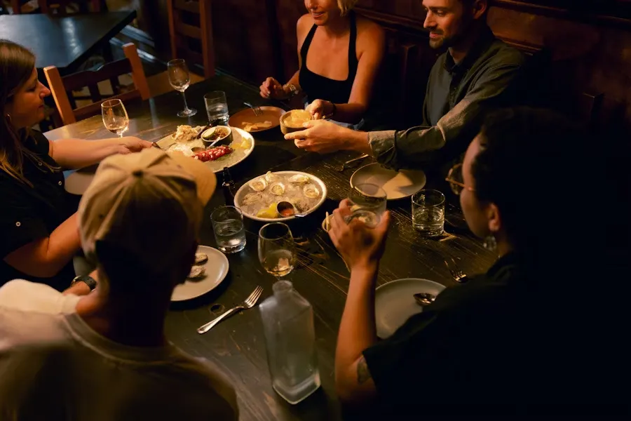People dining at restaurant table